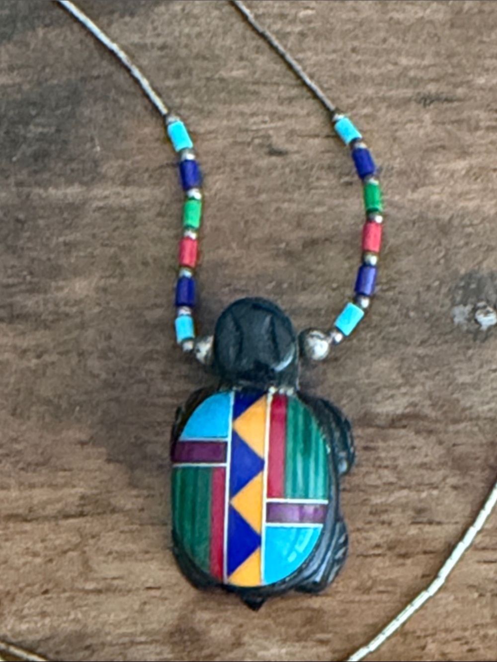 Silver necklace with geometric turtle pendant
